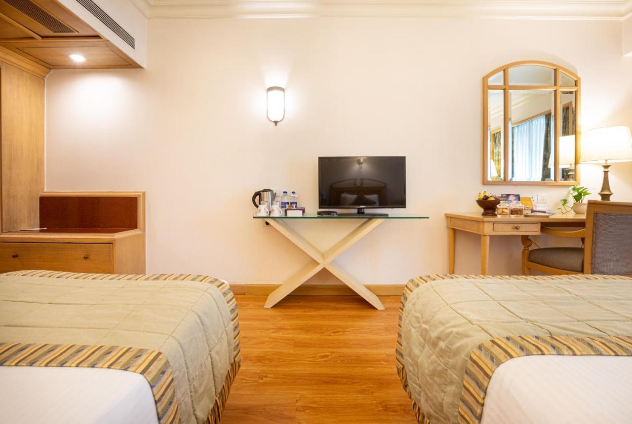 The Orchid Hotel Mumbai Vile Parle Екстериор снимка A room at the hotel