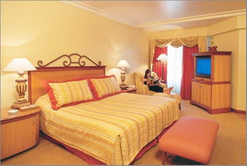 The Orchid Hotel Mumbai Vile Parle Стая снимка A bedroom at the hotel