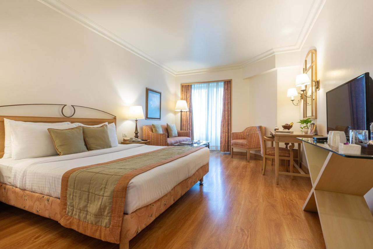 The Orchid Hotel Mumbai Vile Parle Екстериор снимка A room at the hotel