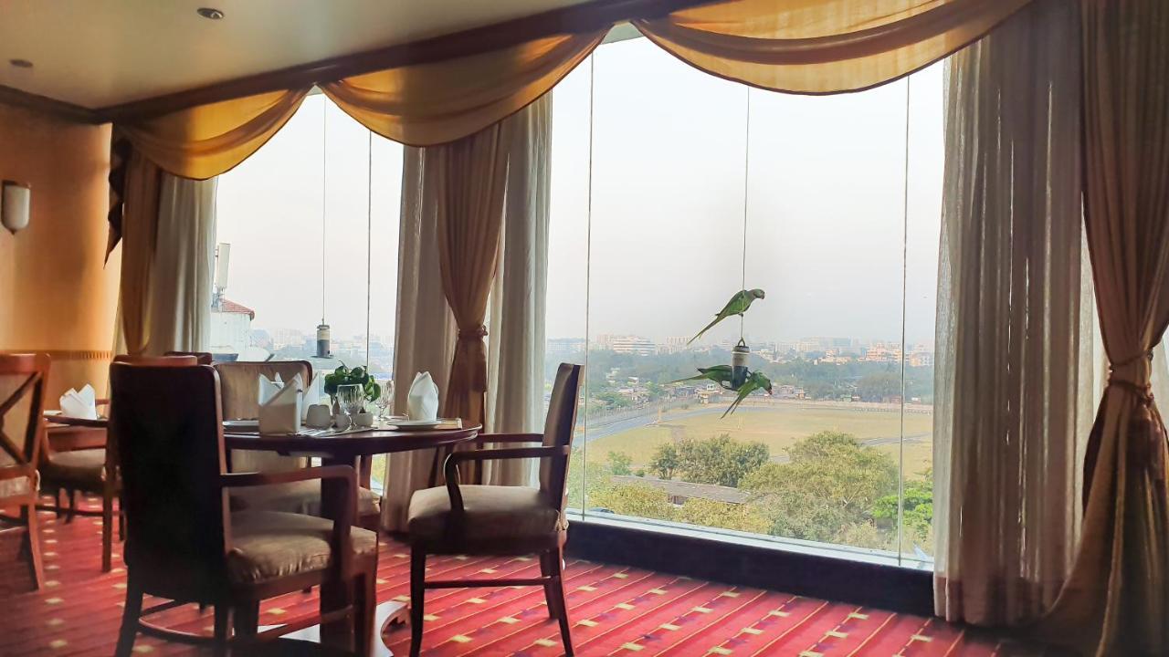 The Orchid Hotel Mumbai Vile Parle Екстериор снимка Parrots at the hotel